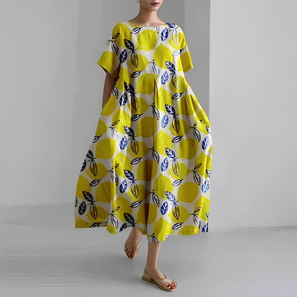 freja | afslappet blomstret midikjole gul